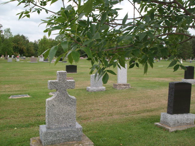 cemetery lawn with headstones