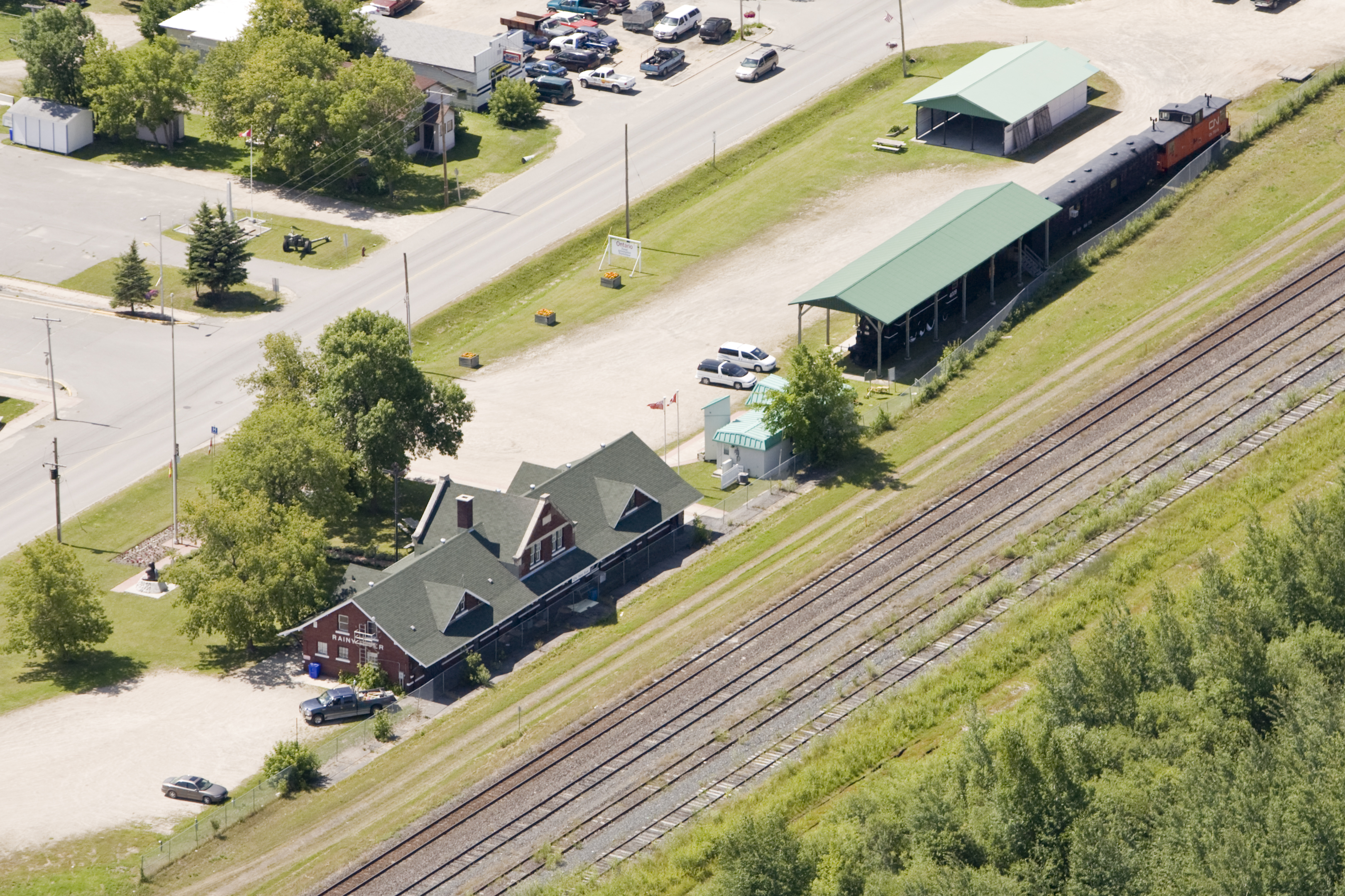 <div class="text-large">aerial view of road with a house</div>