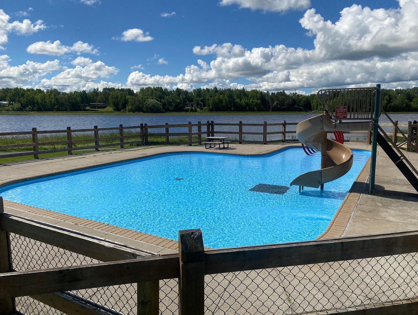 <div class="text-large">pool with a twisting slide</div>