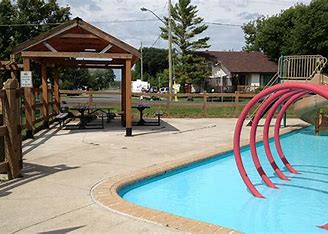 <div class="text-large">a shed with a small section of a pool</div>