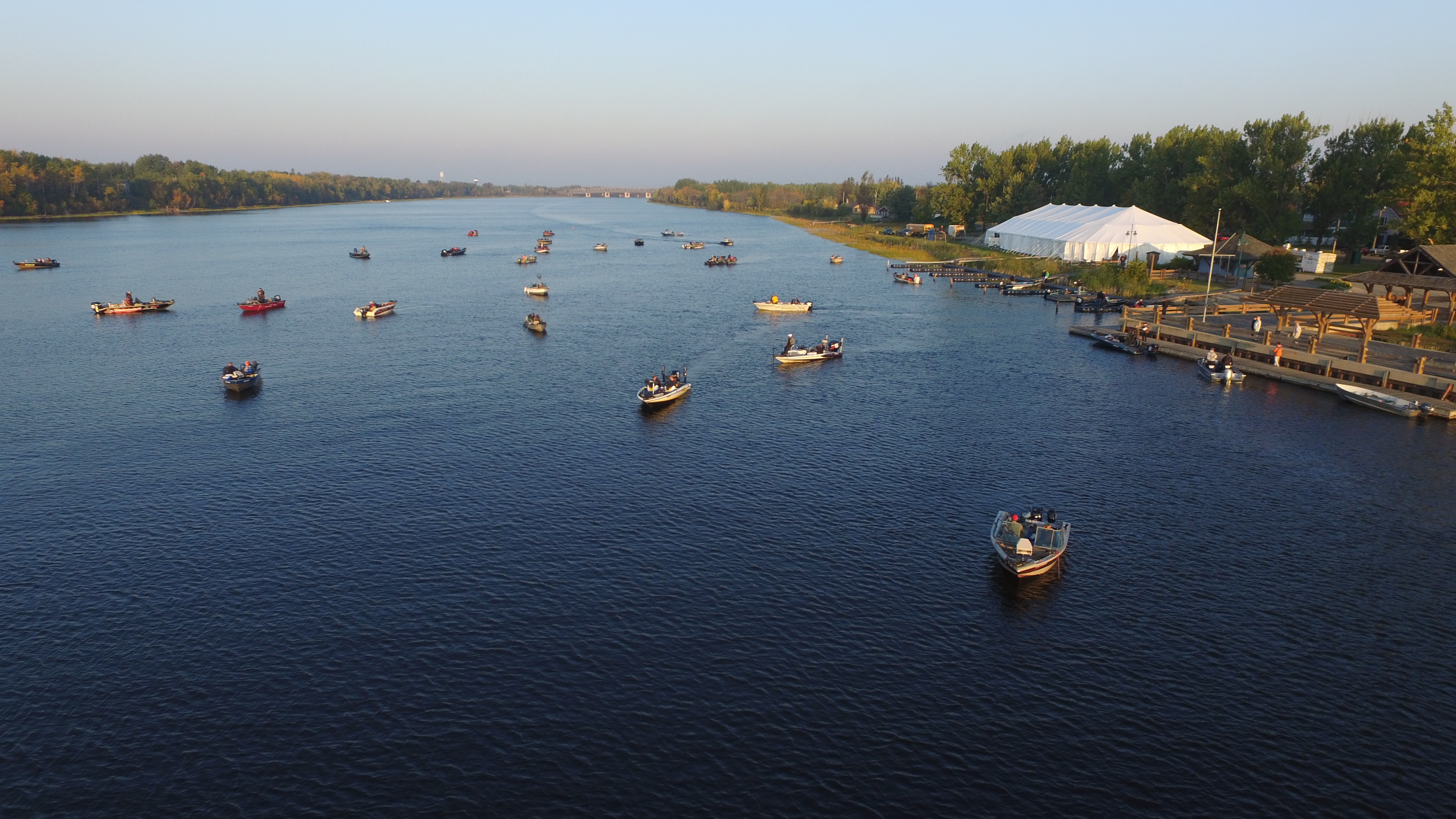 lake with a bunch of boats on the water